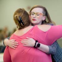 PSS hugging at luncheon